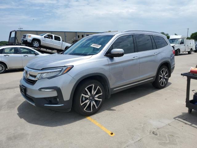 HONDA PILOT TOUR 2020 with VIN 5FNYF6H61LB064647 - Photo from auction