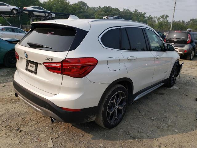 Photo 3 from auction – 2018 BMW X1 XDRIVE2 with VIN WBXHT3C39J5K31200
