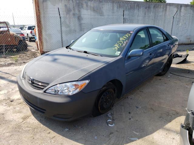 TOYOTA CAMRY LE 2002 with VIN 4T1BE32K52U618206 - Photo from auction