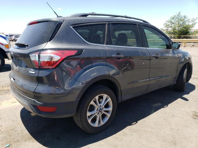 Photo 3 from auction – 2018 FORD ESCAPE SE with VIN 1FMCU0GD1JUC60410