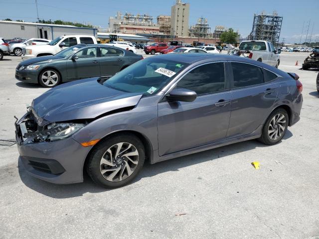 HONDA CIVIC EX 2018 with VIN 19XFC2F78JE011497 - Photo from auction