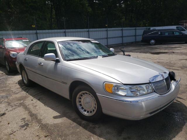 Photo 4 from auction – 2000 LINCOLN TOWN CAR E with VIN 1LNHM81W7YY880356