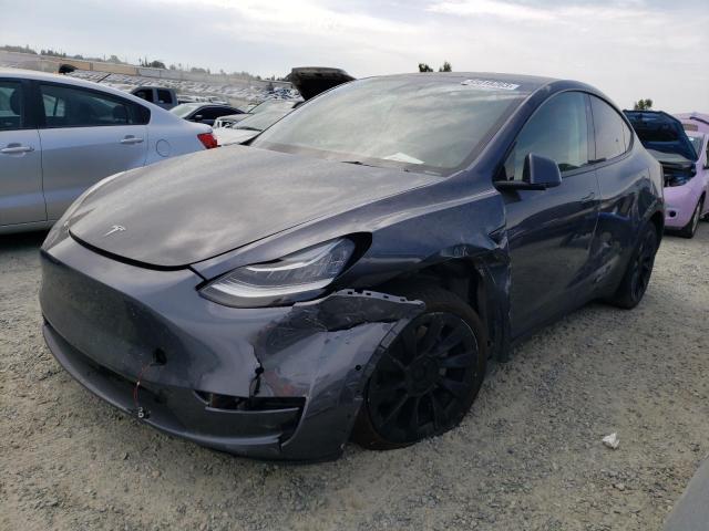 TESLA MODEL Y 2022 with VIN 7SAYGAEE3NF492611 - Photo from auction