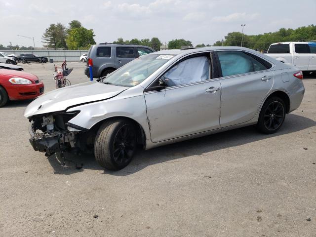 TOYOTA CAMRY LE 2017 with VIN 4T1BF1FKXHU694055 - Photo from auction