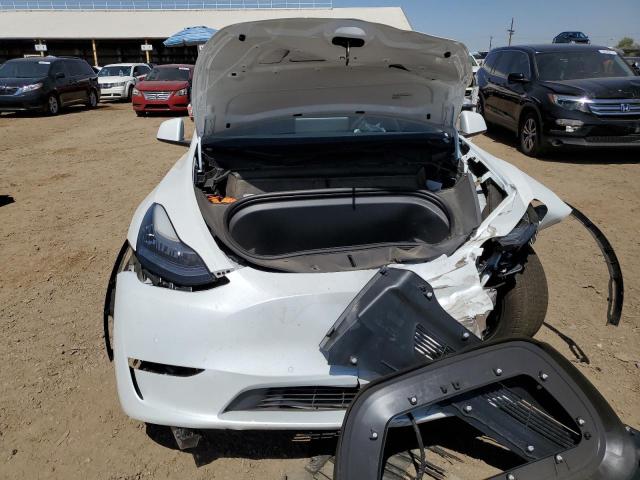 Photo 5 from auction – 2022 TESLA MODEL Y with VIN 7SAYGDEE2NF386295