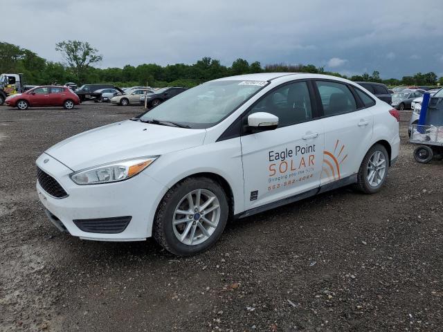 FORD FOCUS SE 2015 with VIN 1FADP3F28FL286586 - Photo from auction