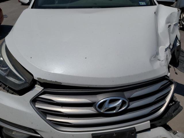 Photo 11 from auction – 2017 HYUNDAI SANTA FE S with VIN 5NMZU3LB5HH010285