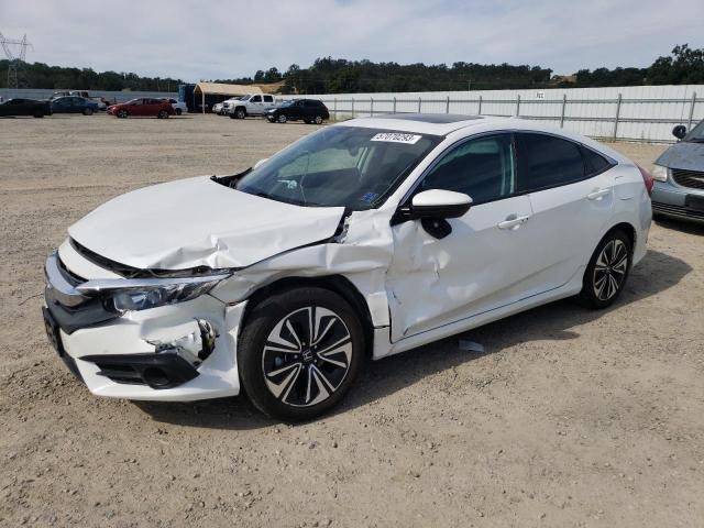 HONDA CIVIC EXL 2018 with VIN 2HGFC1F70JH644589 - Photo from auction