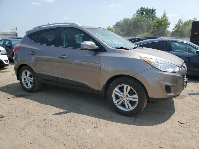 Photo 4 from auction – 2012 HYUNDAI TUCSON GLS with VIN KM8JUCAC3CU352193