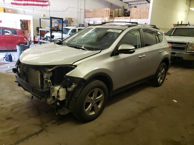 TOYOTA RAV4 XLE 2015 with VIN JTMRFREV6FJ014549 - Photo from auction