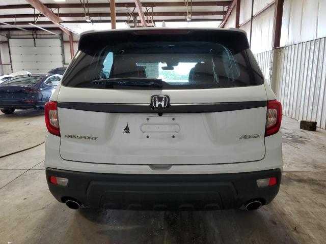 Photo 6 from auction – 2021 HONDA PASSPORT E with VIN 5FNYF8H56MB035889