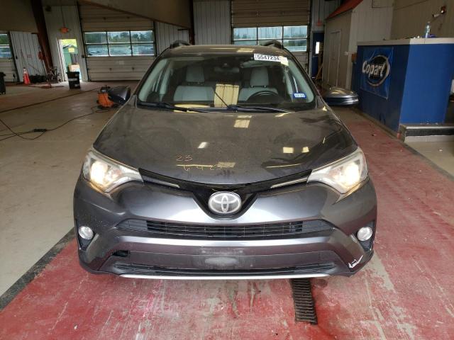Photo 5 from auction – 2017 TOYOTA RAV4 XLE with VIN JTMRFREV6HD213571