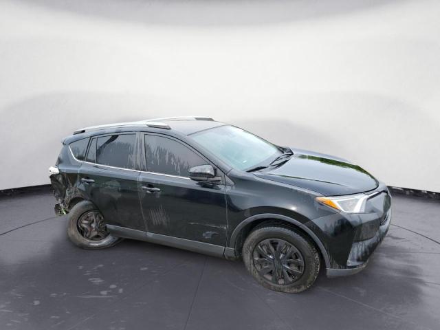 Photo 4 from auction – 2018 TOYOTA RAV4 LE with VIN 2T3ZFREV3JW522035