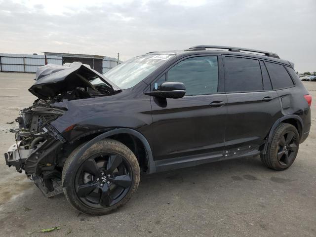 HONDA PASSPORT E 2019 with VIN 5FNYF8H04KB012922 - Photo from auction