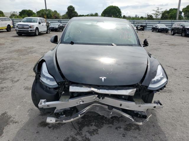 Photo 5 from auction – 2021 TESLA MODEL Y with VIN 5YJYGDEE9MF254257