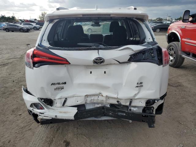 Photo 6 from auction – 2017 TOYOTA RAV4 LE with VIN JTMBFREV6HJ153522