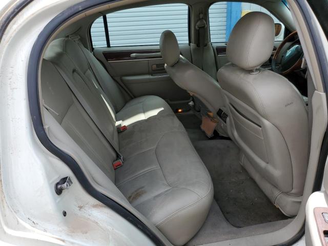 Photo 10 from auction – 2004 LINCOLN TOWN CAR U with VIN 1LNHM83W54Y653609