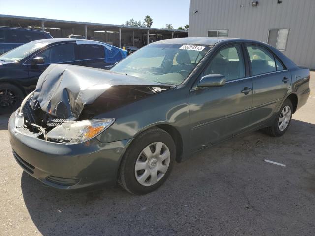 TOYOTA CAMRY LE 2003 with VIN 4T1BE30KX3U730133 - Photo from auction