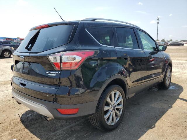 Photo 3 from auction – 2017 FORD ESCAPE TIT with VIN 1FMCU0J95HUA20551