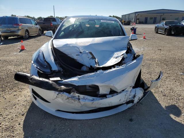 Photo 5 from auction – 2022 TESLA MODEL 3 with VIN 5YJ3E1EB3NF102822