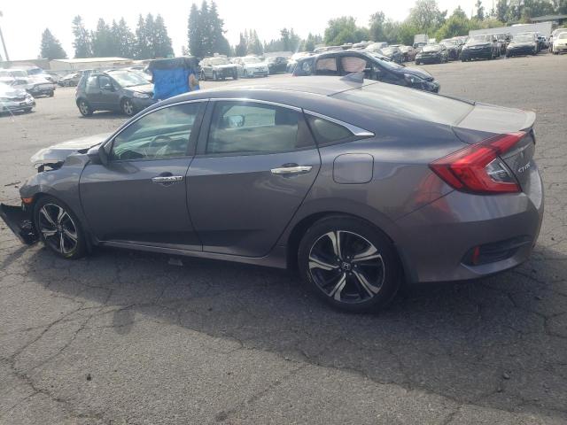 Photo 2 from auction – 2017 HONDA CIVIC TOUR with VIN 19XFC1F96HE201031
