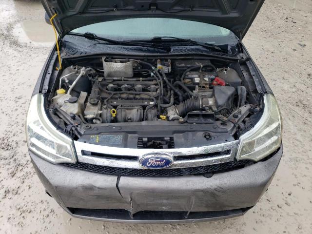 Photo 11 from auction – 2011 FORD FOCUS S with VIN 1FAHP3EN3BW121339