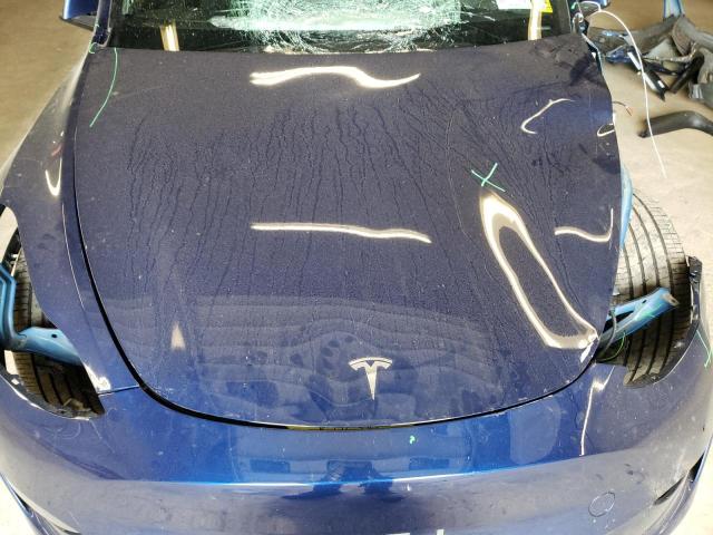 Photo 12 from auction – 2021 TESLA MODEL Y with VIN 5YJYGDEE8MF060254