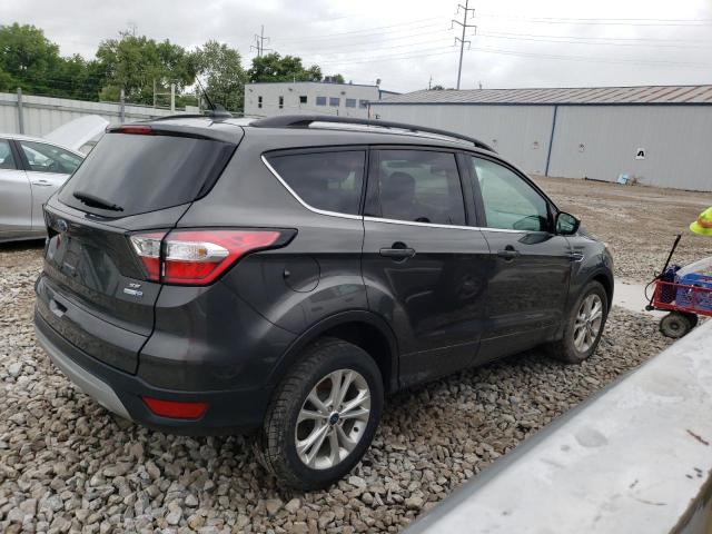 Photo 3 from auction – 2018 FORD ESCAPE SE with VIN 1FMCU9GD9JUC01996