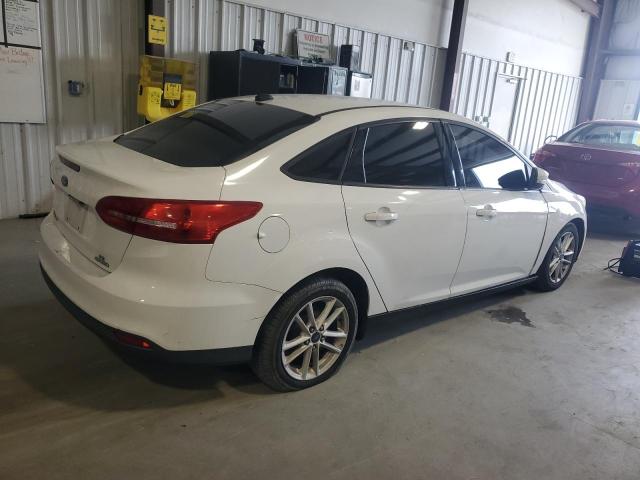 Photo 3 from auction – 2015 FORD FOCUS SE with VIN 1FADP3F21FL295887