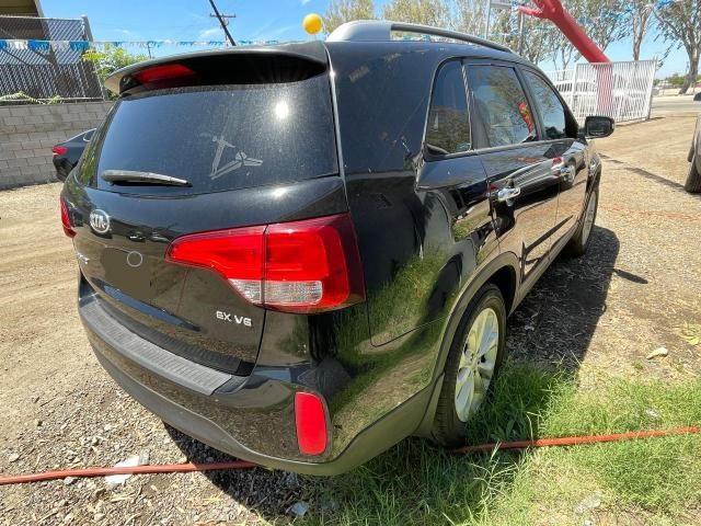 Photo 4 from auction – 2015 KIA SORENTO EX with VIN 5XYKU4A79FG590301