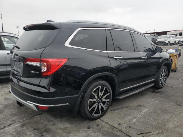 Photo 3 from auction – 2019 HONDA PILOT TOUR with VIN 5FNYF5H95KB033260
