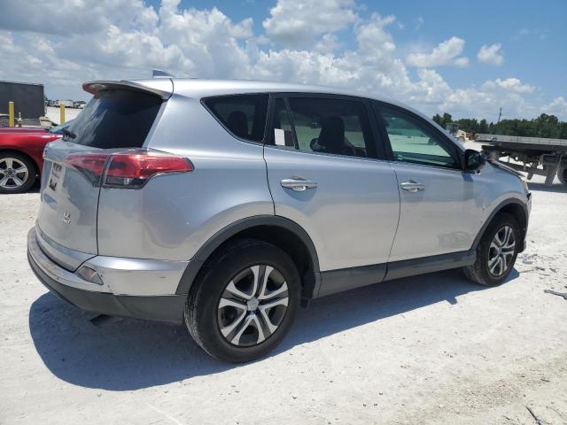 Photo 3 from auction – 2017 TOYOTA RAV4 LE with VIN 2T3BFREV2HW631016