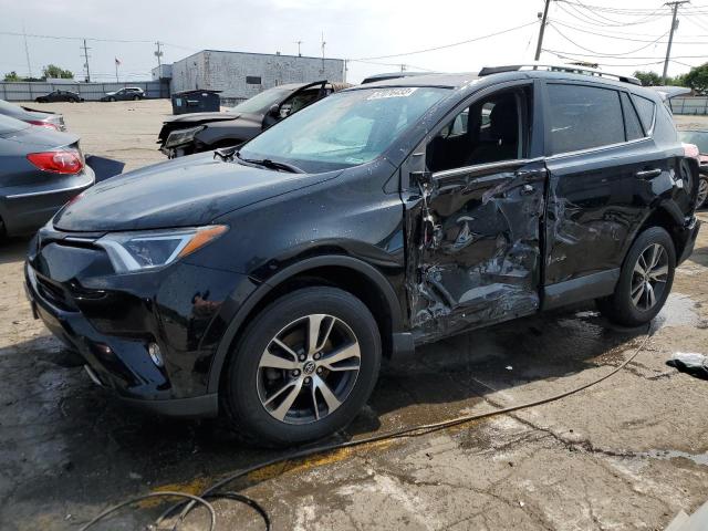 TOYOTA RAV4 XLE 2017 with VIN 2T3RFREV5HW620851 - Photo from auction
