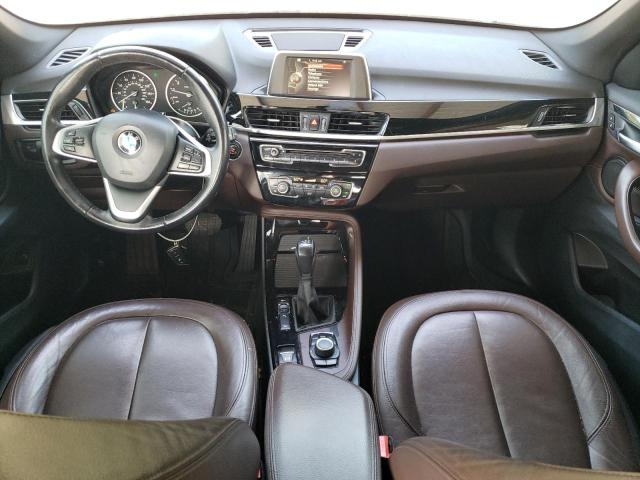 Photo 8 from auction – 2016 BMW X1 XDRIVE2 with VIN WBXHT3C32G5E53332