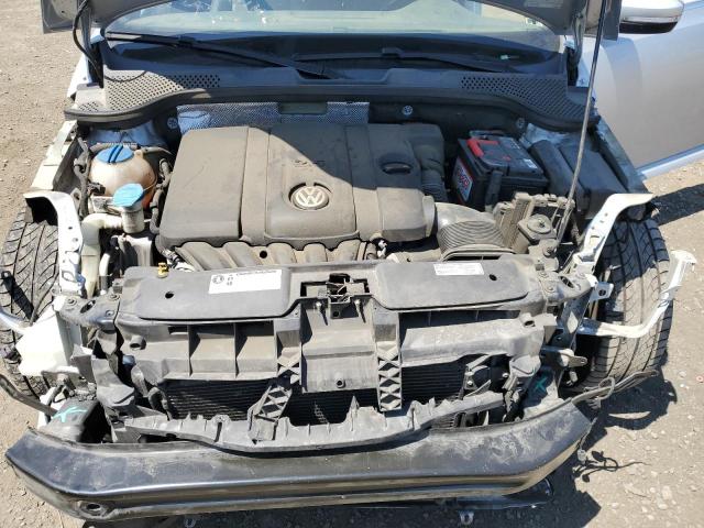 Photo 11 from auction – 2014 VOLKSWAGEN BEETLE with VIN 3VW5P7AT4EM802569