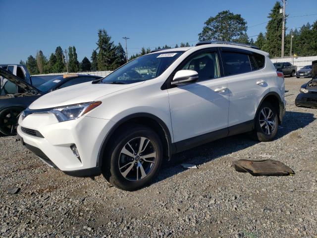 TOYOTA RAV4 XLE 2016 with VIN JTMRFREV9GJ101153 - Photo from auction
