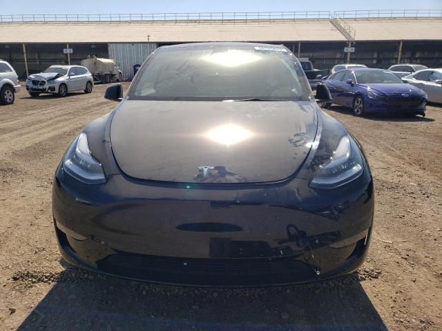 Photo 5 from auction – 2023 TESLA MODEL Y with VIN 7SAYGDEE0PA090756