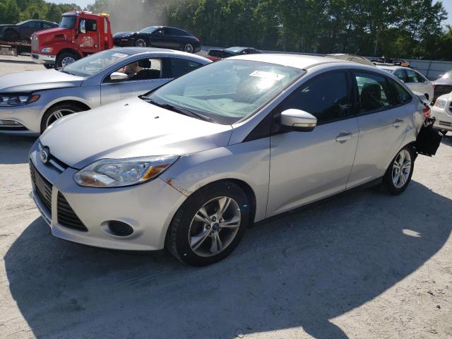 FORD FOCUS SE 2014 with VIN 1FADP3F26EL119075 - Photo from auction