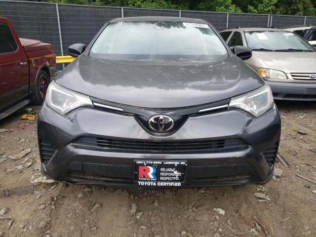 Photo 5 from auction – 2018 TOYOTA RAV4 LE with VIN JTMBFREV5JJ736735