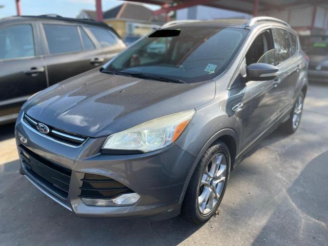 Photo 2 from auction – 2014 FORD ESCAPE TIT with VIN 1FMCU0J90EUA71662