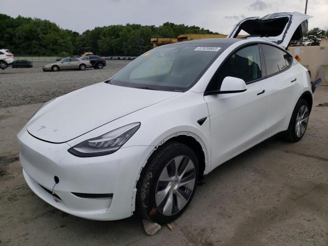 TESLA MODEL Y 2023 with VIN 7SAYGDEE0PA082026 - Photo from auction
