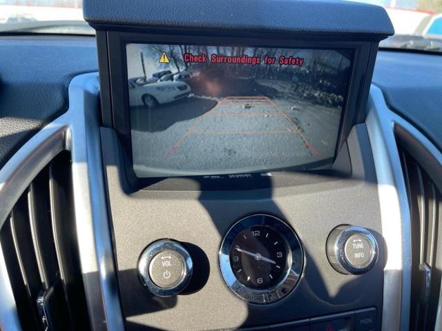 Photo 9 from auction – 2011 CADILLAC SRX PERFOR with VIN 3GYFNEEY1BS557397