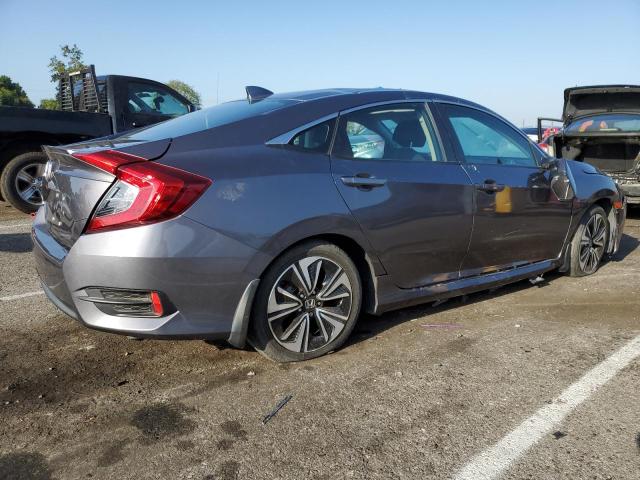 Photo 3 from auction – 2016 HONDA CIVIC EX with VIN 2HGFC1F37GH647138