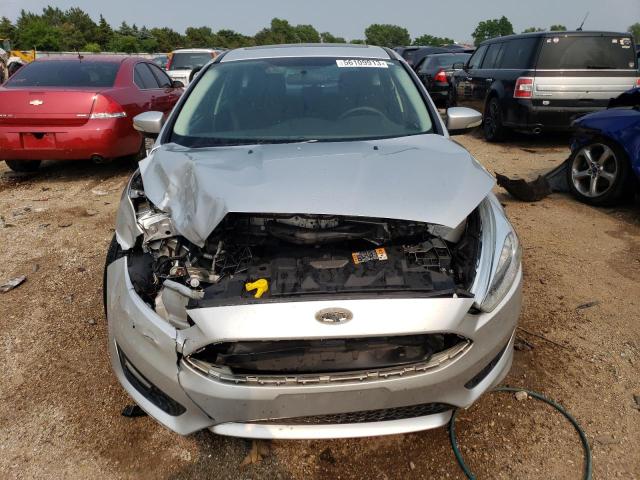 Foto 5 de la subasta – 2015 FORD FOCUS SE con VIN 1FADP3K21FL360551