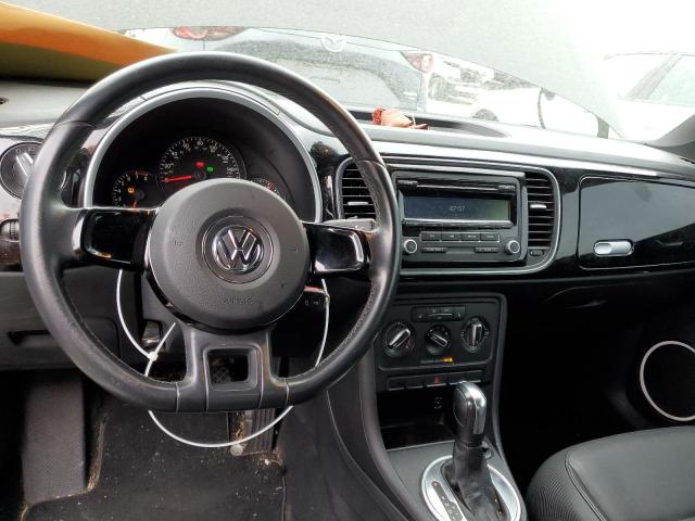 Photo 8 from auction – 2012 VOLKSWAGEN BEETLE with VIN 3VWJP7AT2CM640565
