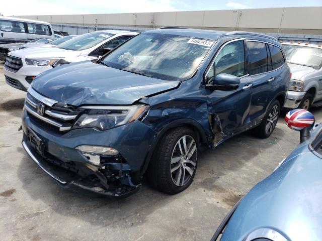 HONDA PILOT ELIT 2017 z numerem VIN 5FNYF6H04HB094079 - Zdjęcie z aukcji