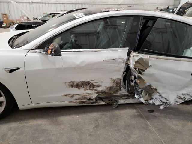 Photo 7 from auction – 2018 TESLA MODEL 3 with VIN 5YJ3E1EB2JF089085