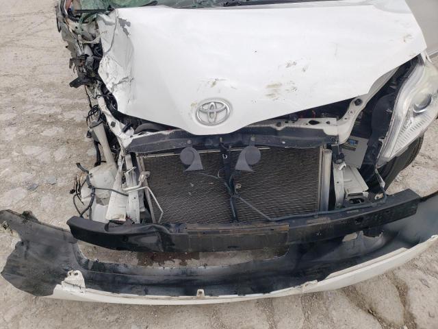 Photo 12 from auction – 2013 TOYOTA SIENNA XLE with VIN 5TDDK3DC3DS054929
