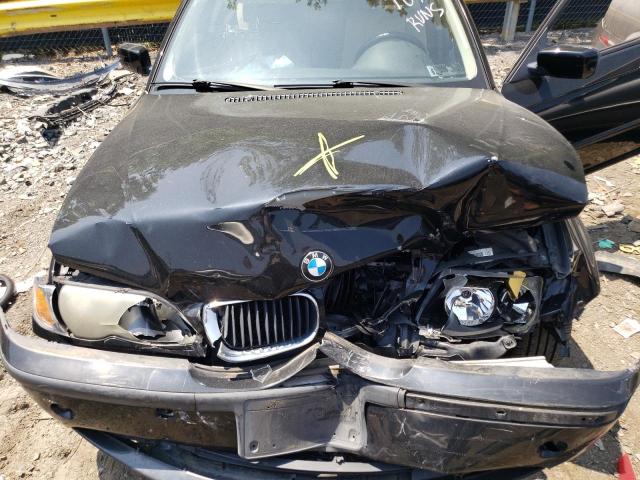 Photo 11 from auction – 2005 BMW 325 I with VIN WBAET37445NJ89671