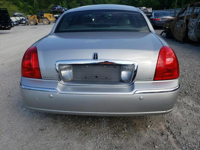 Photo 6 from auction – 2004 LINCOLN TOWN CAR E with VIN 1LNHM81W24Y612048